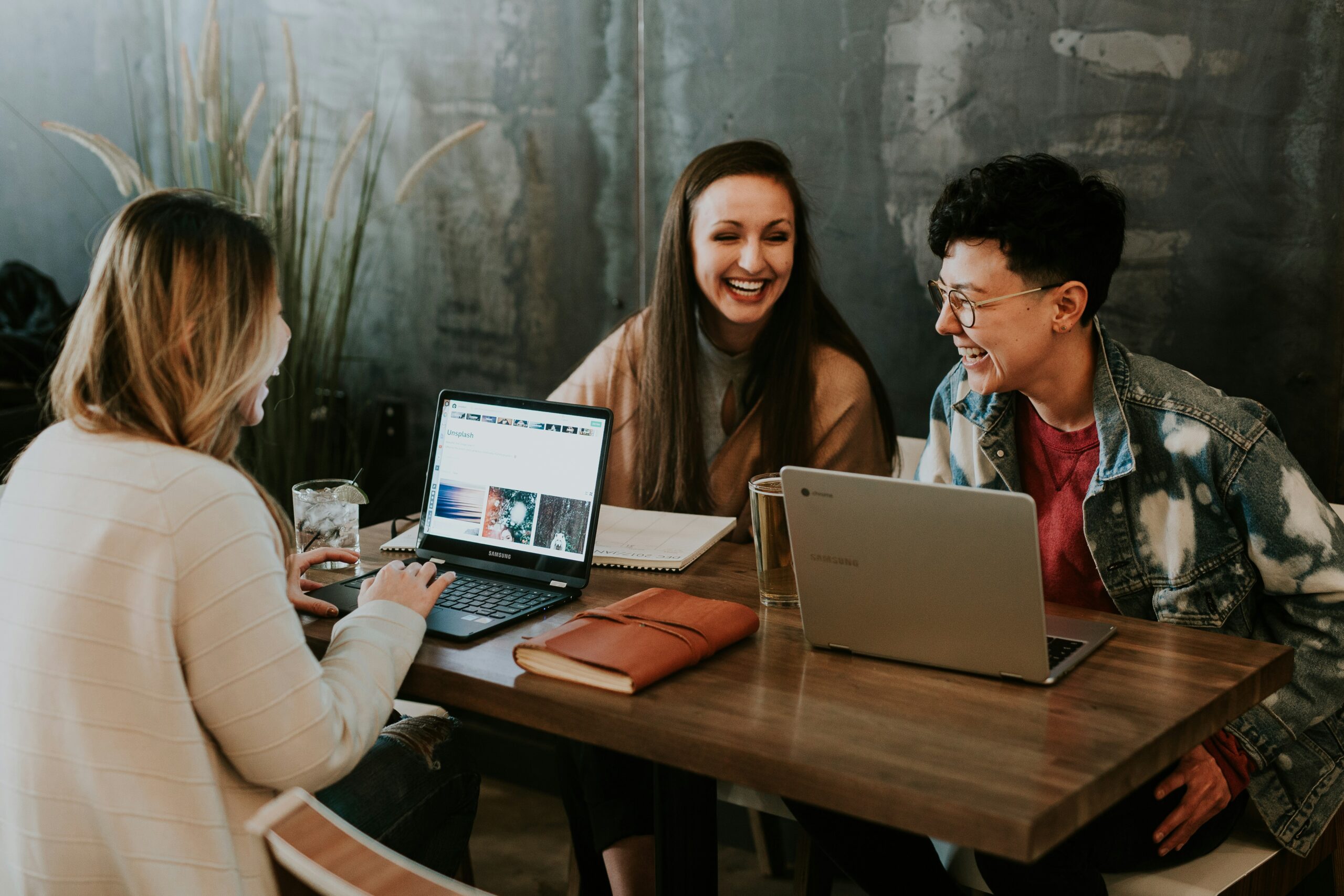 department-of-education-dfe-case-study-group-of-people-sitting-around-table-with-laptops