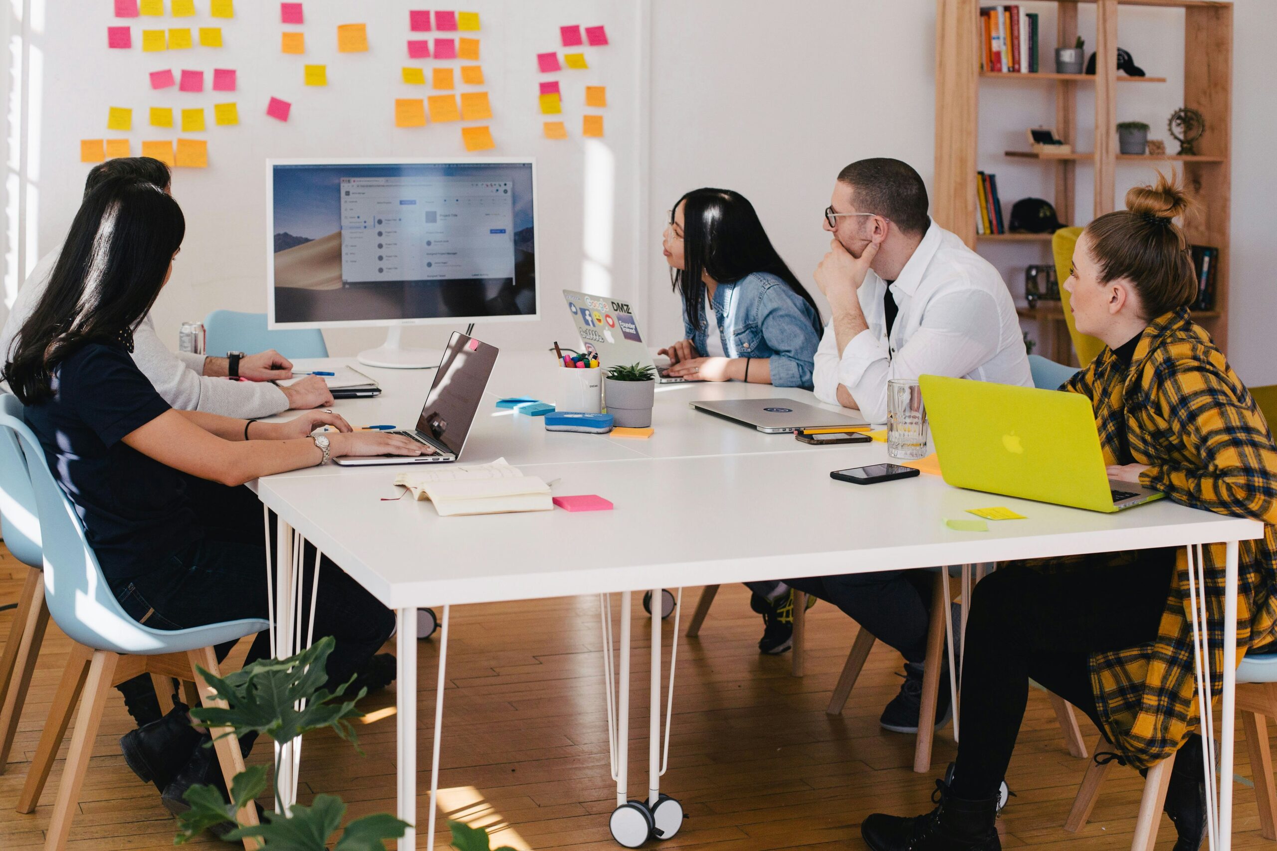 about-censuswide-market-research-consultancy-team-meeting-people-sitting-around-table